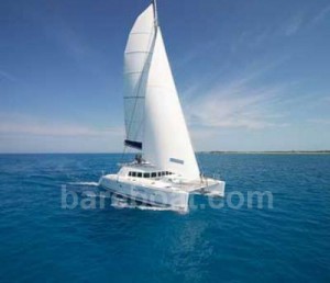 Bareboat catamaran sailboats are stable, spacious, and can carry many watersports toys. They are great for watching dolphins play on the bow!